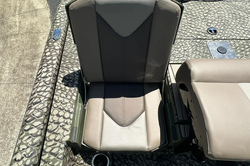 Slide: The Image of 2026 Vexus ACX 2000 boat seat with patterned flooring and cup holder. - 14