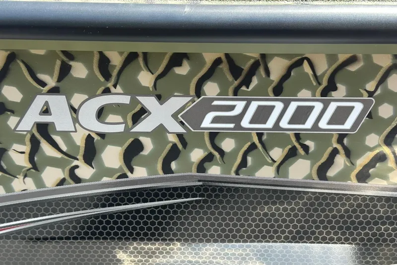 Slide: The Image of 2026 Vexus ACX 2000 logo on camouflage background. - 25