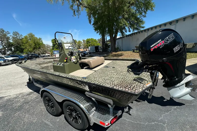 Slide: The Image of 2026 Vexus ACX 2000 boat with Mercury Pro XS engine on a trailer. - 4