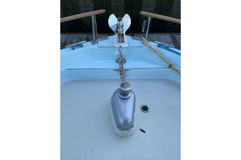 Slide: The Image of 1972 Whitcraft Hatteras boat deck with anchor chain and winch. - 8