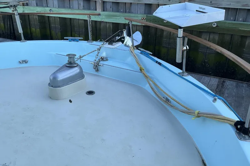 Slide: The Image of 1972 Whitcraft Hatteras boat deck with winch and anchor chain. - 9