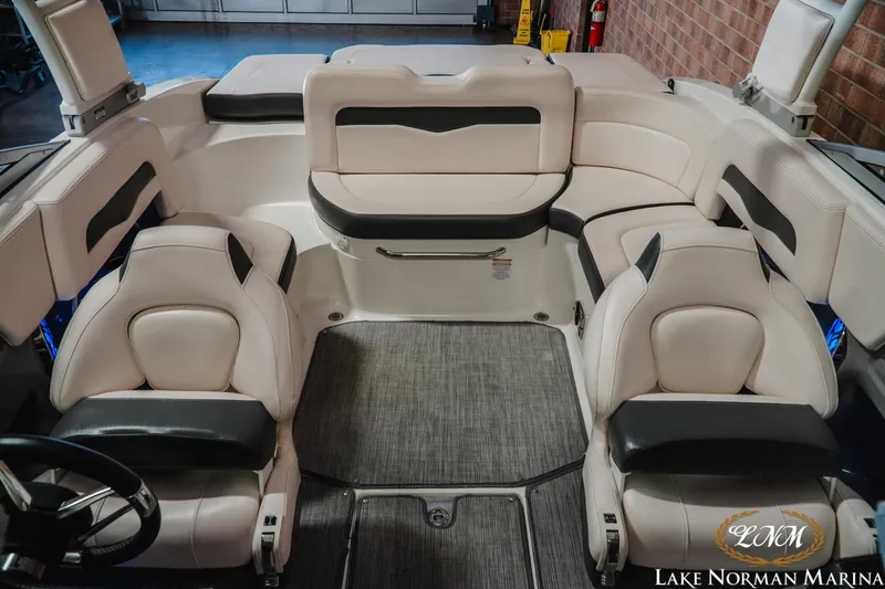 Slide: The Image of 2017 Chaparral 246 SSi boat interior with white and black seating at Lake Norman Marina. - 14