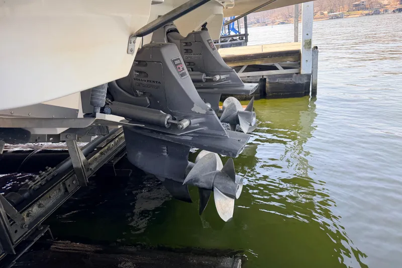 Slide: The Image of 2005 Regal 3350 Sport Cruiser with Volvo Penta outdrives at dockside. - 26