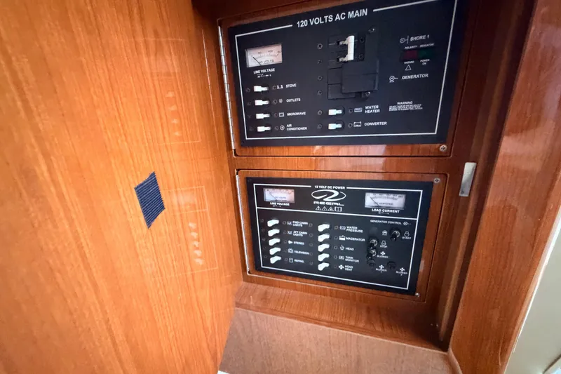 Slide: The Image of Electrical control panel on a 2005 Regal 3350 Sport Cruiser boat. - 27