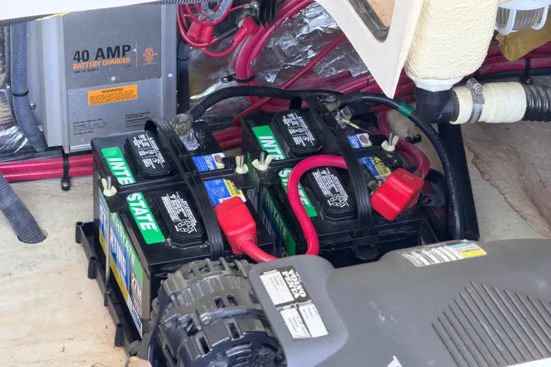 Slide: The Image of Battery compartment of 2005 Regal 3350 Sport Cruiser with Interstate batteries and 40 AMP charger. - 35