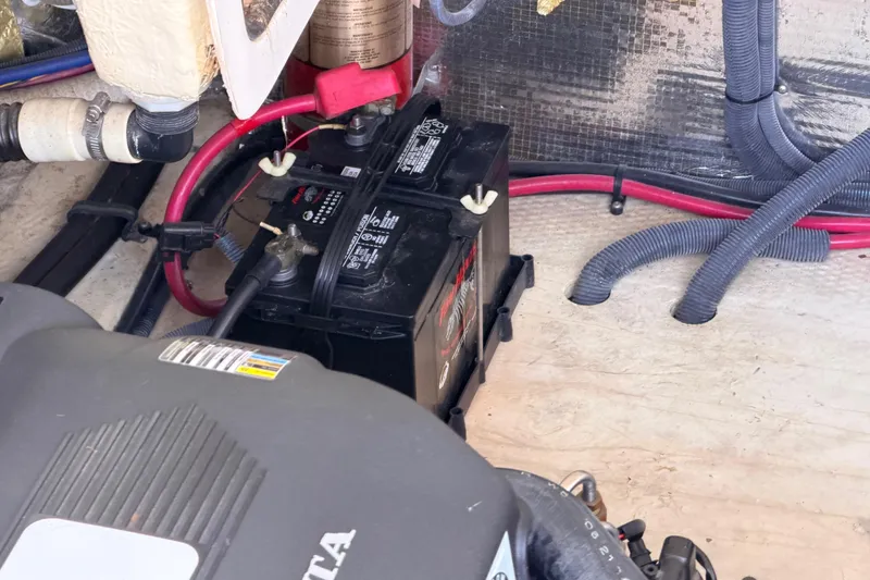 Slide: The Image of Engine compartment of a 2005 Regal 3350 Sport Cruiser with battery and wiring. - 36