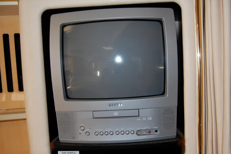 Slide: The Image of Toshiba CRT TV with built-in DVD player on 2000 Sea Ray 340 Sundancer yacht. - 13