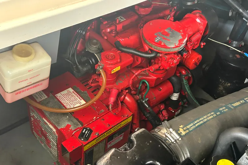 Slide: The Image of Engine compartment of a 2000 Sea Ray 340 Sundancer with Westerbeke generator. - 40