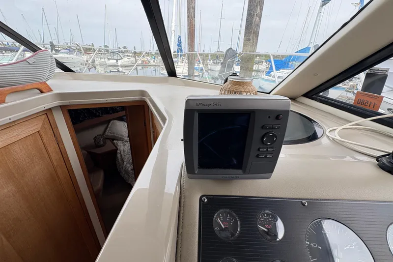 Slide: The Image of Interior view of 1988 Bayliner 3587 Motoryacht with GPS and control panel. - 54