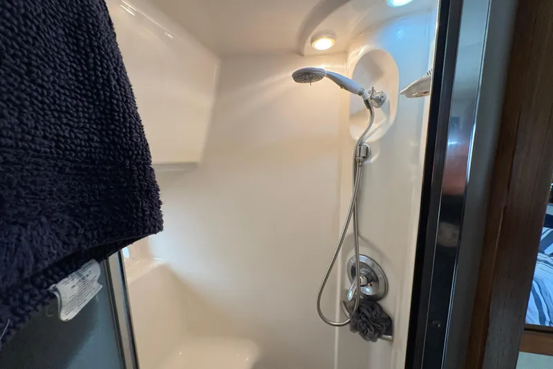 Slide: The Image of Shower area in 1988 Bayliner 3587 Motoryacht with modern fixtures and lighting. - 95