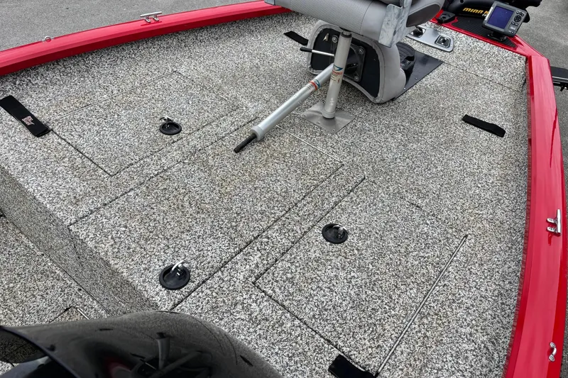 Slide: The Image of 2015 Tracker Pro Team 175 TXW boat deck with seating and storage compartments. - 6