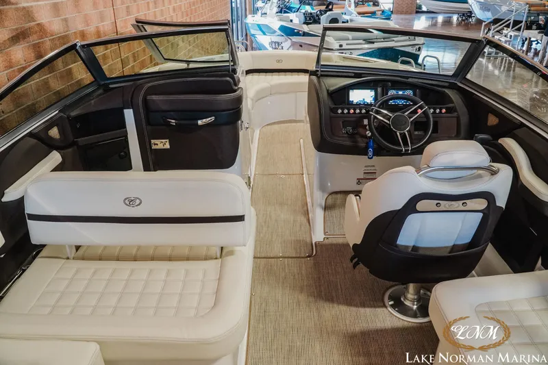 Slide: The Image of 2021 Cobalt R5 boat interior with luxurious seating and modern dashboard at Lake Norman Marina. - 10