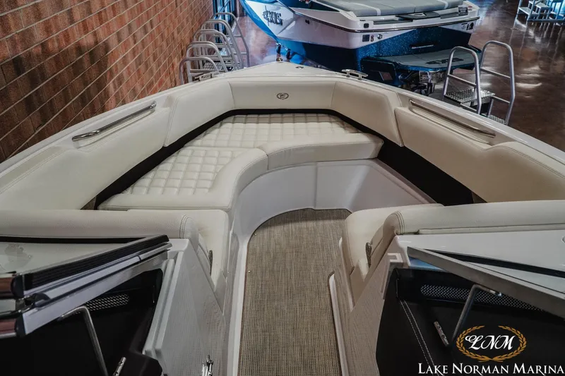 Slide: The Image of 2021 Cobalt R5 boat interior with plush seating at Lake Norman Marina. - 16