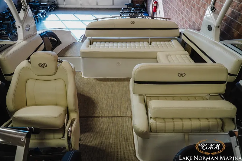Slide: The Image of 2021 Cobalt R5 boat interior with beige seating at Lake Norman Marina. - 18