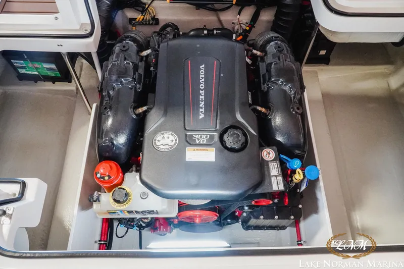 Slide: The Image of 2021 Cobalt R5 boat engine compartment featuring a Volvo Penta 300 V8 engine. - 20