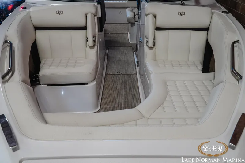 Slide: The Image of Interior of a 2021 Cobalt R5 boat with white leather seating. - 5