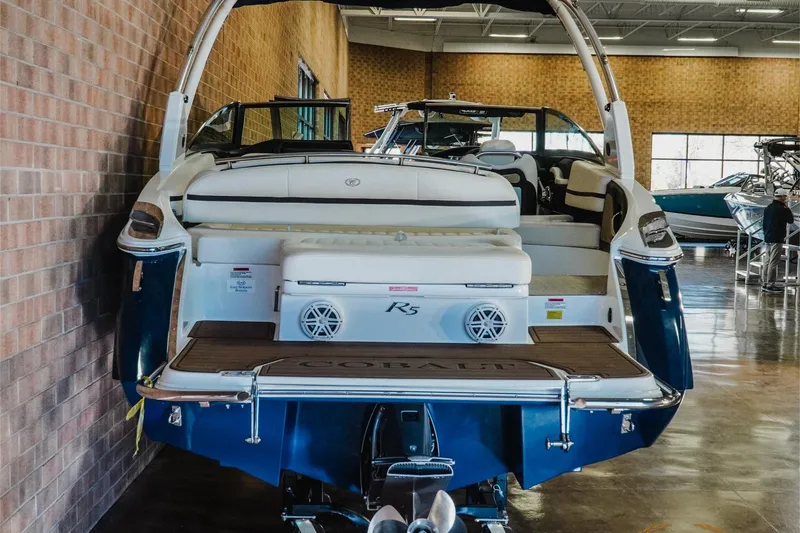 Slide: The Image of 2021 Cobalt R5 boat displayed indoors, showcasing sleek design and luxurious seating. - 7
