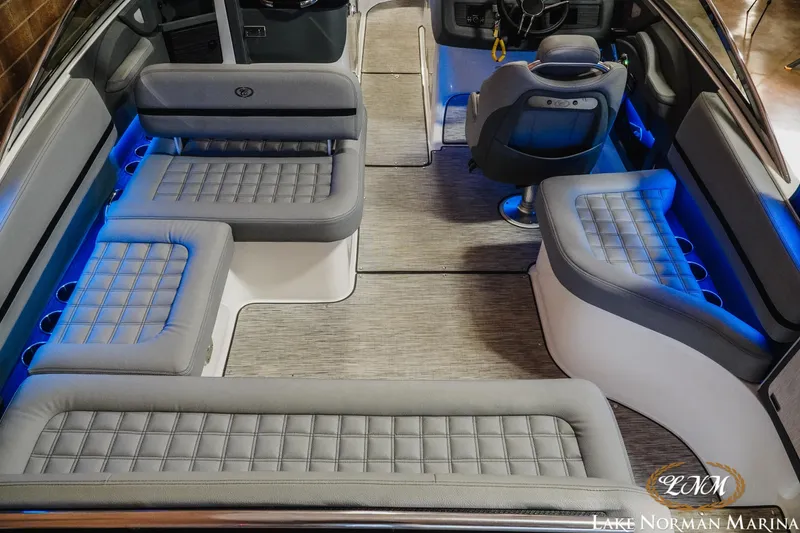 Slide: The Image of Luxurious interior of 2021 Cobalt R5 boat with gray seating and blue LED lighting. - 11