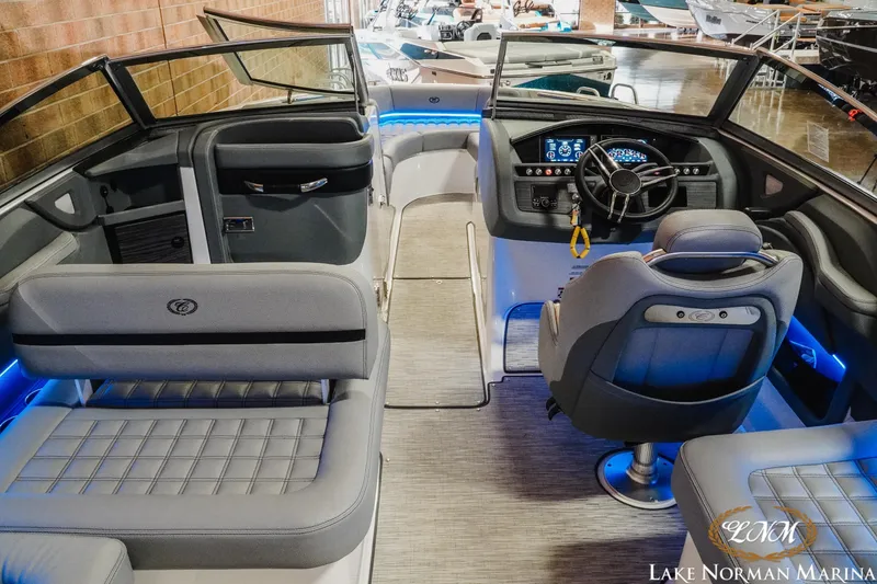 Slide: The Image of 2021 Cobalt R5 boat interior with modern dashboard and seating at Lake Norman Marina. - 12
