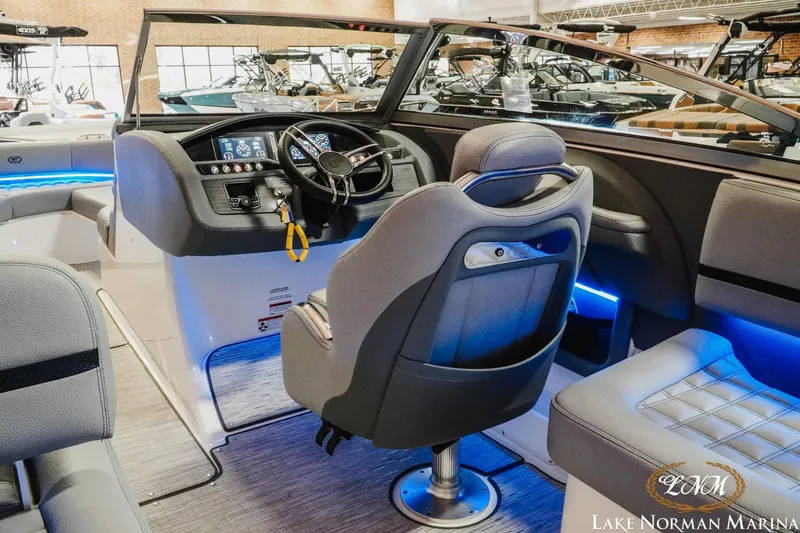 Slide: The Image of Interior of a 2021 Cobalt R5 boat with modern dashboard and seating at Lake Norman Marina. - 13