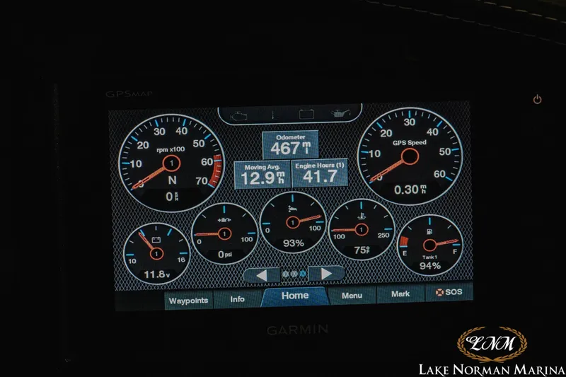 Slide: The Image of Dashboard display of a 2021 Cobalt R5 boat showing speed, RPM, and fuel levels. - 24