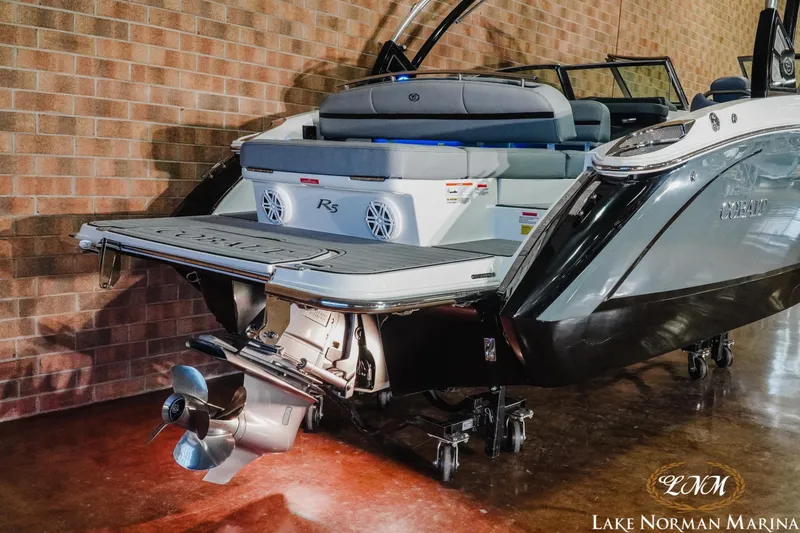 Slide: The Image of 2021 Cobalt R5 boat displayed indoors at Lake Norman Marina. - 6