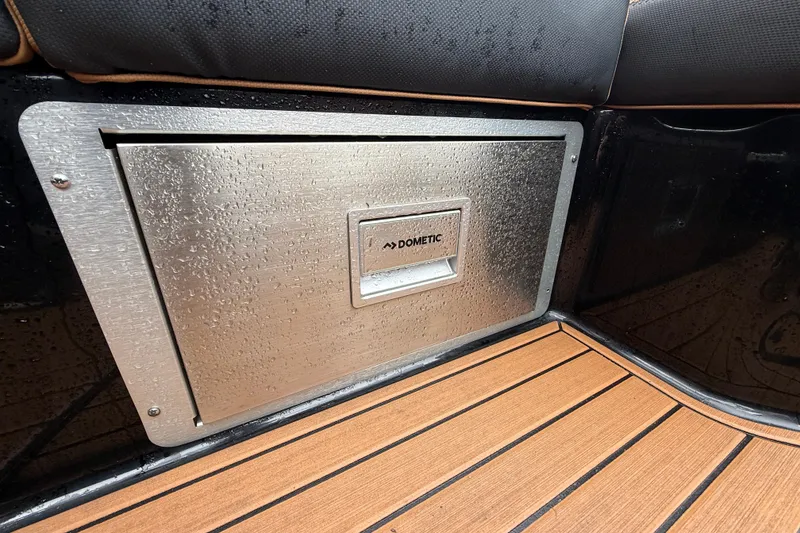 Slide: The Image of Stainless steel Dometic panel on 2021 MasterCraft X26 boat with teak flooring. - 20