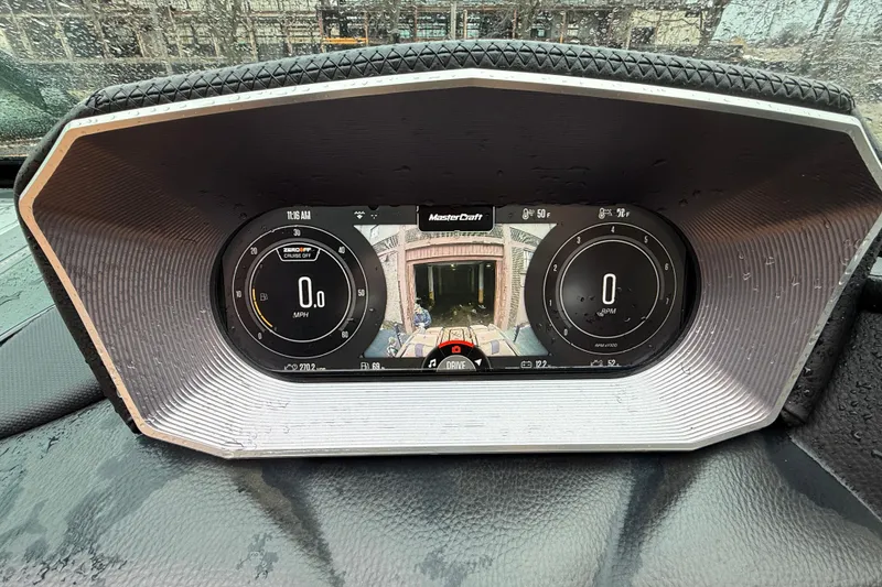 Slide: The Image of Dashboard of 2021 MasterCraft X26 boat with digital display and controls. - 25