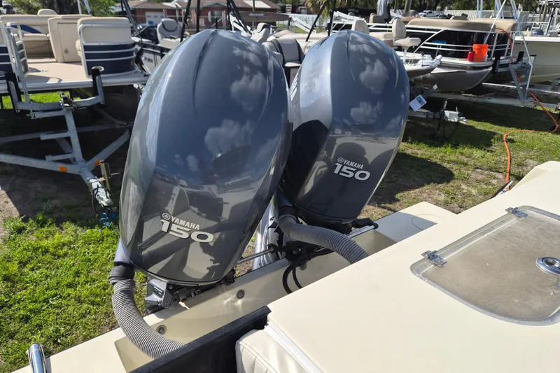 Slide: The Image of Twin Yamaha 150 outboard motors on a 2008 Contender 23 Tournament boat. - 15