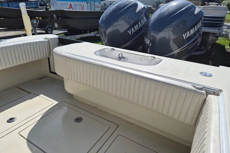 Slide: The Image of 2008 Contender 23 Tournament boat with Yamaha engines, featuring spacious seating and storage. - 4