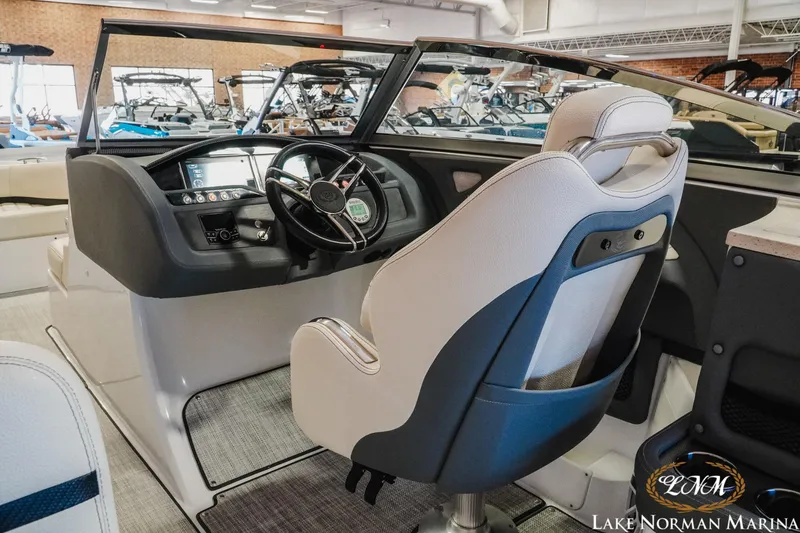 Slide: The Image of 2020 Cobalt R7 Surf boat interior with steering wheel and dashboard at Lake Norman Marina. - 16
