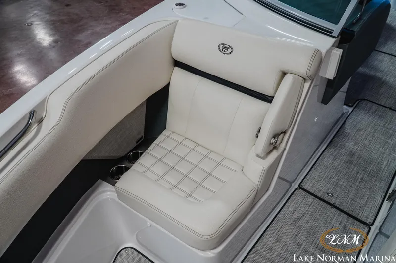Slide: The Image of 2020 Cobalt R7 Surf boat interior with white cushioned seating at Lake Norman Marina. - 23