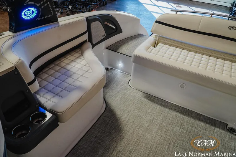 Slide: The Image of 2020 Cobalt R7 Surf boat interior with cushioned seating and cup holders at Lake Norman Marina. - 28