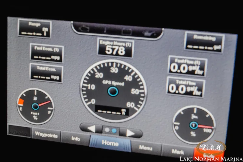 Slide: The Image of Dashboard display of a 2020 Cobalt R7 Surf boat showing engine hours and fuel metrics. - 31