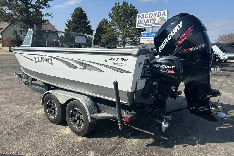 Slide: The Image of 2018 Lund 2075 Tyee boat with Mercury Pro XS engine on trailer. - 4