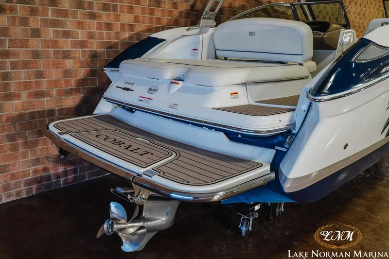 Slide: The Image of 2011 Cobalt 242 WSS boat with swim platform at Lake Norman Marina. - 6