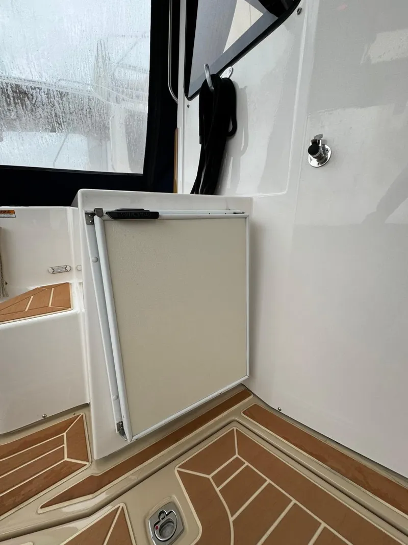 Slide: The Image of 2018 Ranger Tugs R-31S Ranger Tug interior with storage compartment. - 13