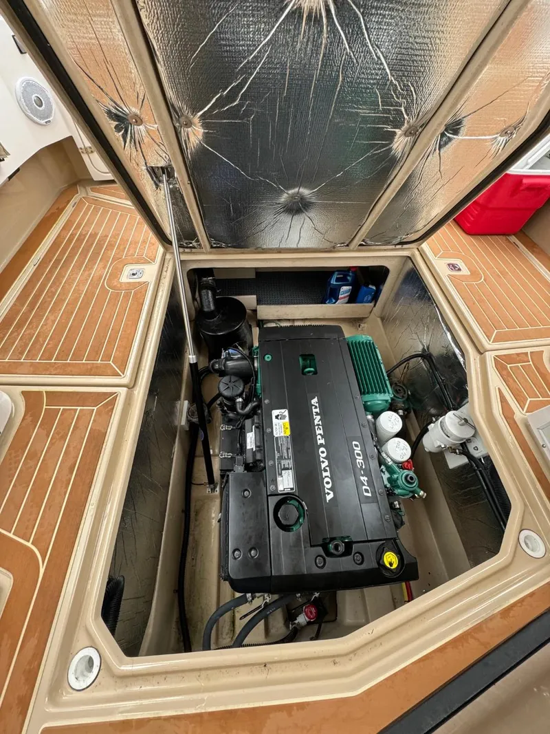 Slide: The Image of 2018 Ranger Tugs R-31S engine compartment with Volvo Penta engine. - 18