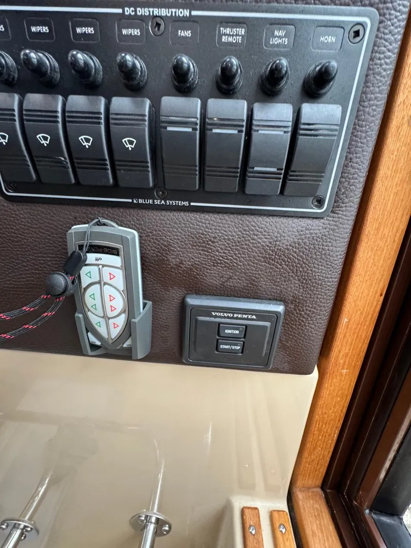 Slide: The Image of Control panel of a 2018 Ranger Tugs R-31S Ranger Tug boat. - 38