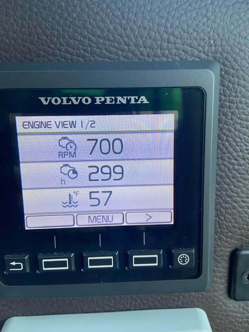 Slide: The Image of Volvo Penta engine display on 2018 Ranger Tugs R-31S showing RPM, hours, and temperature. - 40