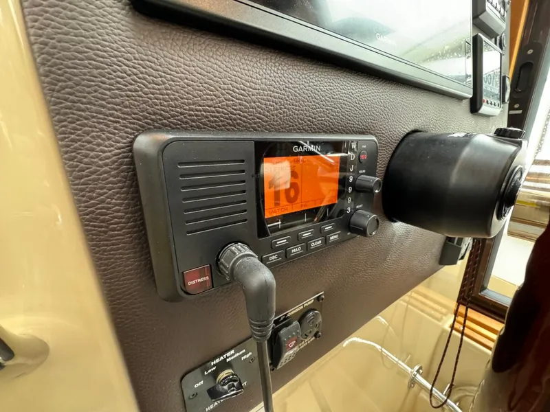 Slide: The Image of Garmin navigation system on 2018 Ranger Tugs R-31S Ranger Tug dashboard. - 41