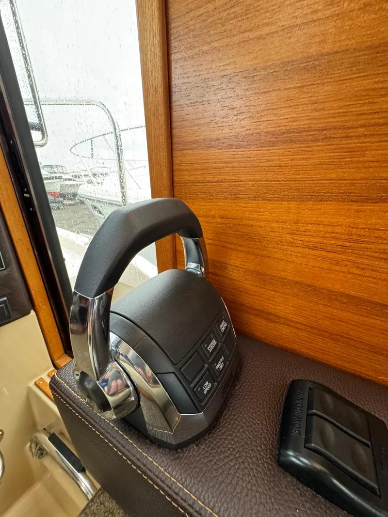 Slide: The Image of 2018 Ranger Tugs R-31S Ranger Tug throttle control and dashboard. - 42