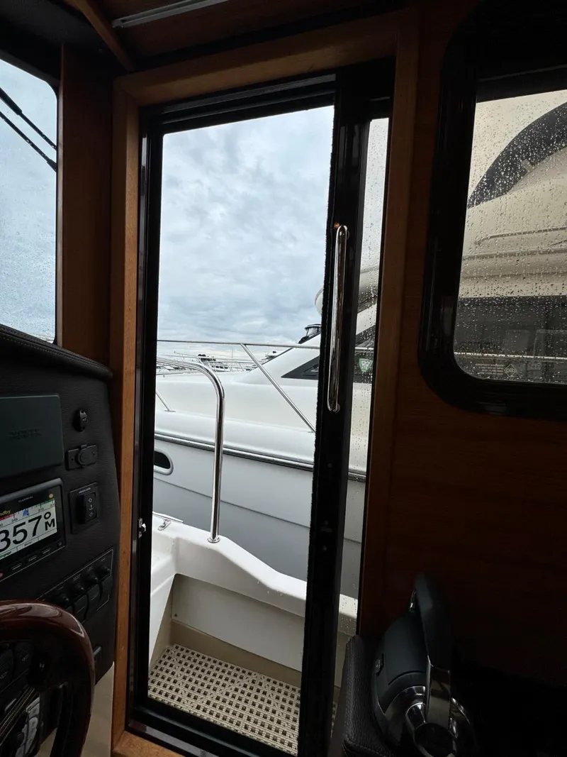 Slide: The Image of Interior view of 2018 Ranger Tugs R-31S Ranger Tug, looking out through the cabin door. - 46