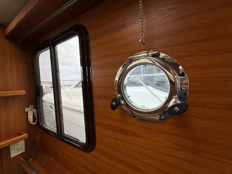 Slide: The Image of 2018 Ranger Tugs R-31S Ranger Tug interior with porthole and window. - 47