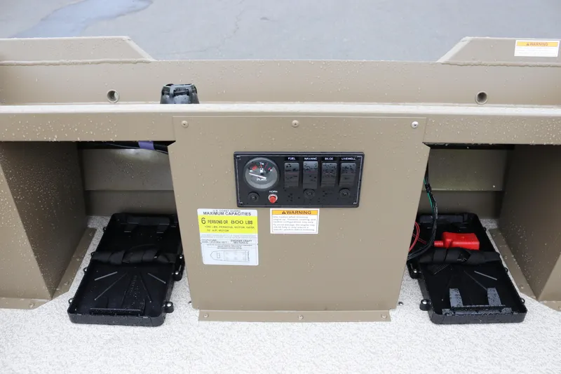 Slide: The Image of Control panel of 2026 Smoker Craft Sportsman 1660 boat with capacity label. - 12