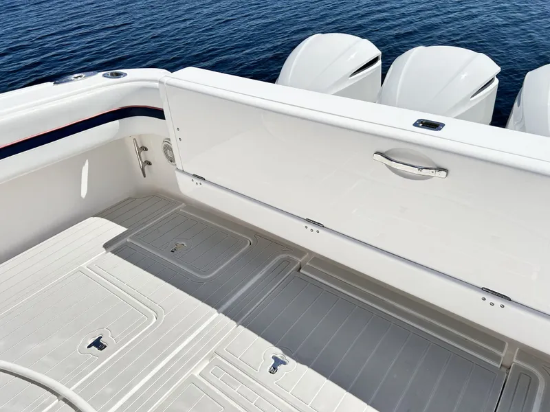 Slide: The Image of Intrepid 475 Sport Yacht 2018 with three outboard engines. - 17