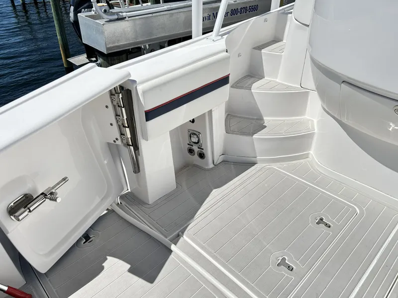 Slide: The Image of Intrepid 475 Sport Yacht 2018, interior view with stairs and deck. - 20