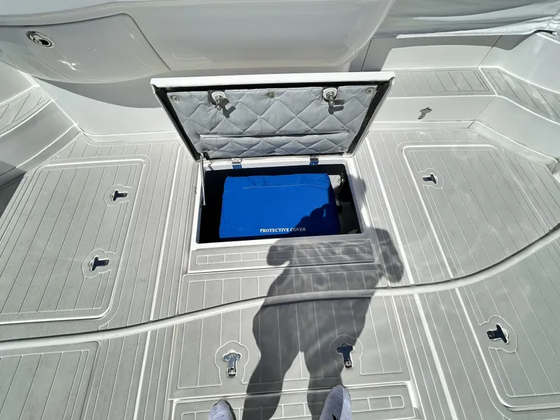 Slide: The Image of Intrepid 475 Sport Yacht 2018 with open storage hatch. - 27