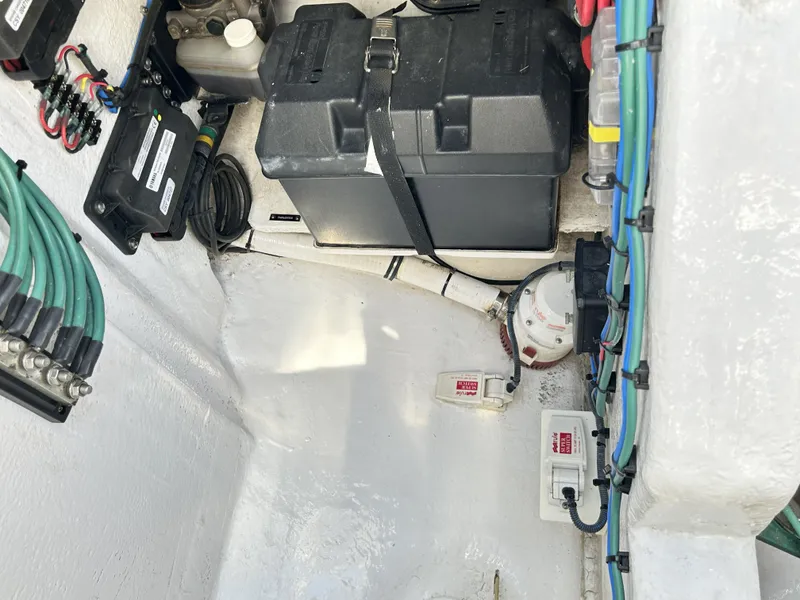 Slide: The Image of Electrical system of 2018 Intrepid 475 Sport Yacht with cables and battery. - 37