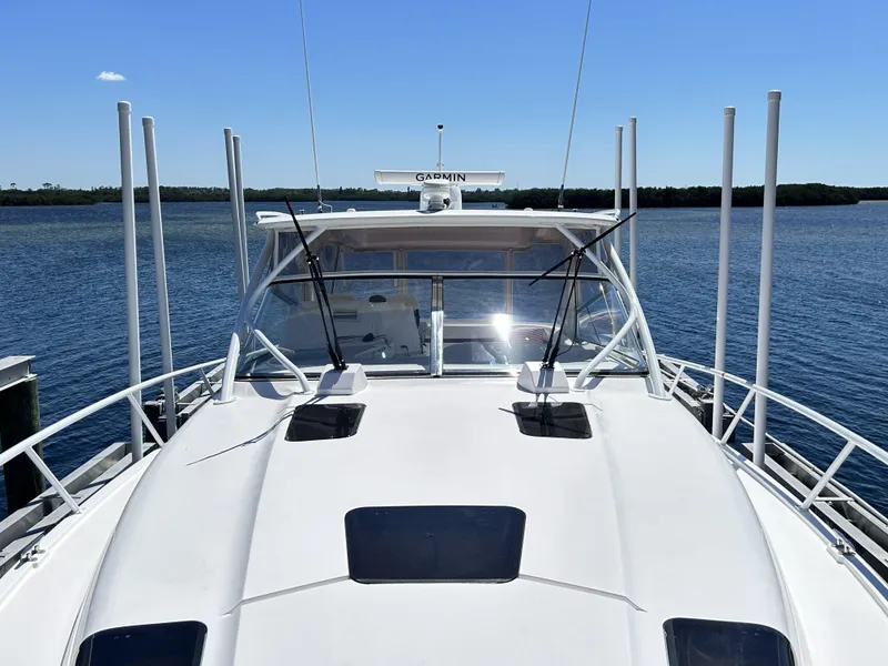 Slide: The Image of 2018 Intrepid 475 Sport Yacht on calm waters. - 42